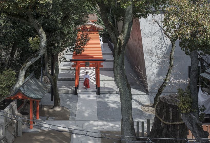 the takenaka group pay reverence to kobe's ikuta shrine with a minimal concrete treasure house