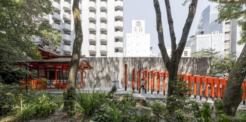 the takenaka group pay reverence to kobe's ikuta shrine with a minimal concrete treasure house