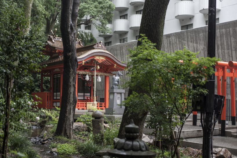 the takenaka group pay reverence to kobe's ikuta shrine with a minimal concrete treasure house