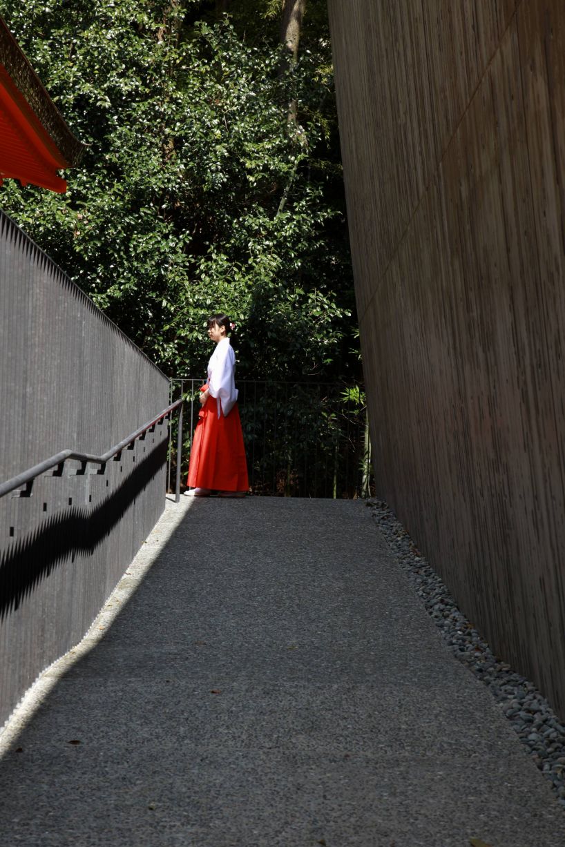 the takenaka group pay reverence to kobe's ikuta shrine with a minimal concrete treasure house