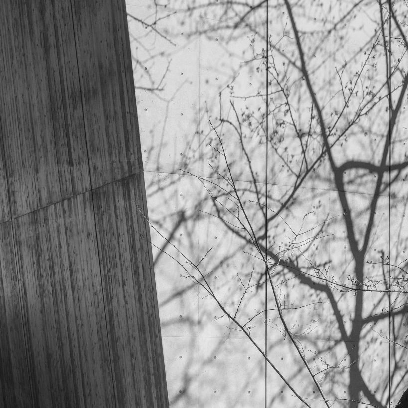 the takenaka group pay reverence to kobe's ikuta shrine with a minimal concrete treasure house