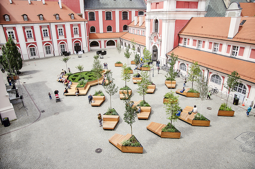 atelier starzak strebicki revives courtyard in poland with landscaped street furniture
