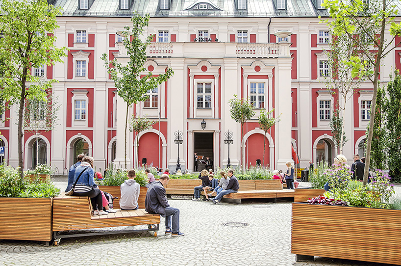 atelier starzak strebicki revives courtyard in poland with landscaped street furniture
