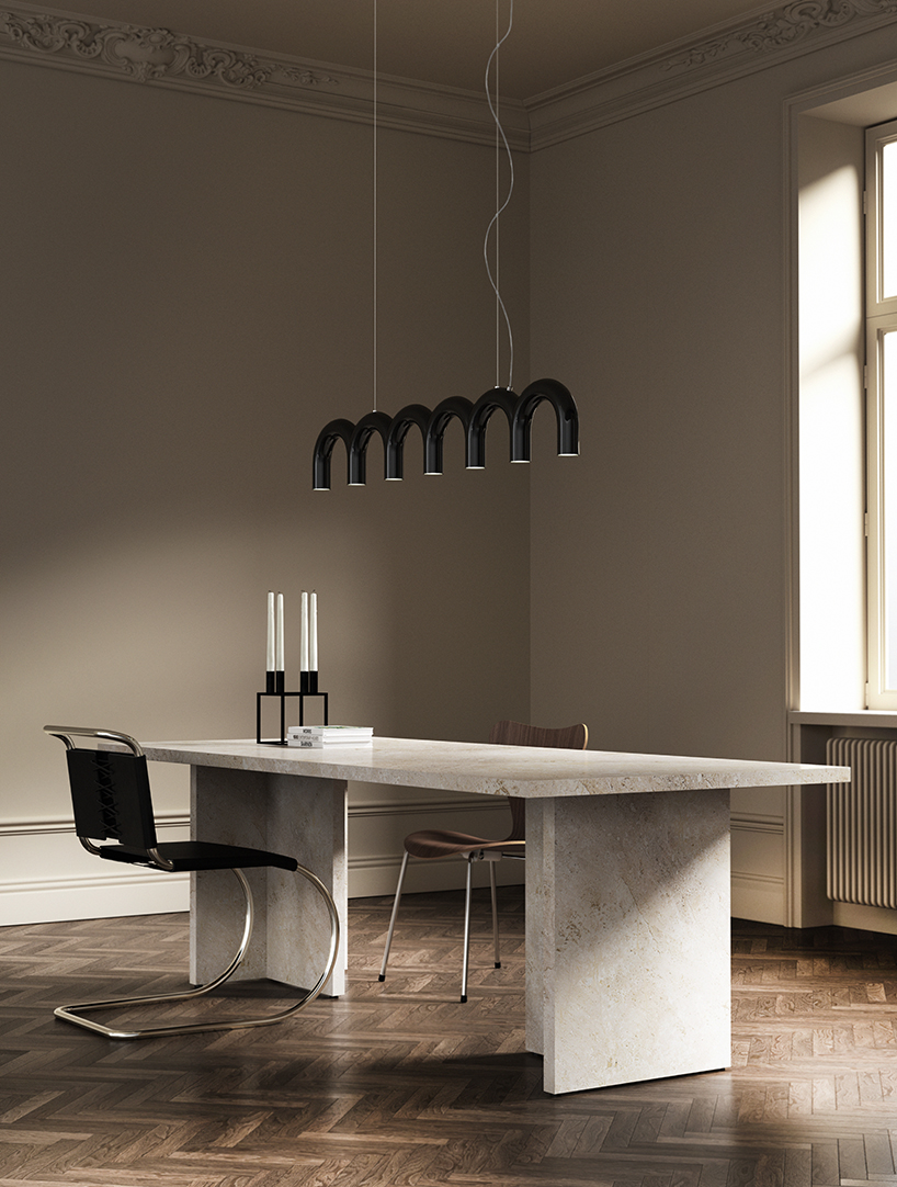 handcrafted arch pendant light by oblure pays homage to architectural vaults