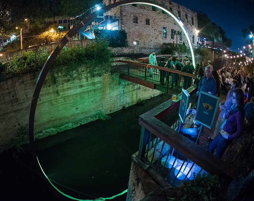 east side collective light up austin with a glowing LED arch