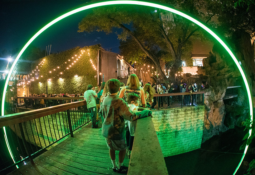 east side collective light up austin with a glowing LED arch