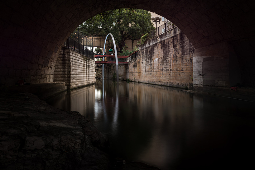 east side collective light up austin with a glowing LED arch
