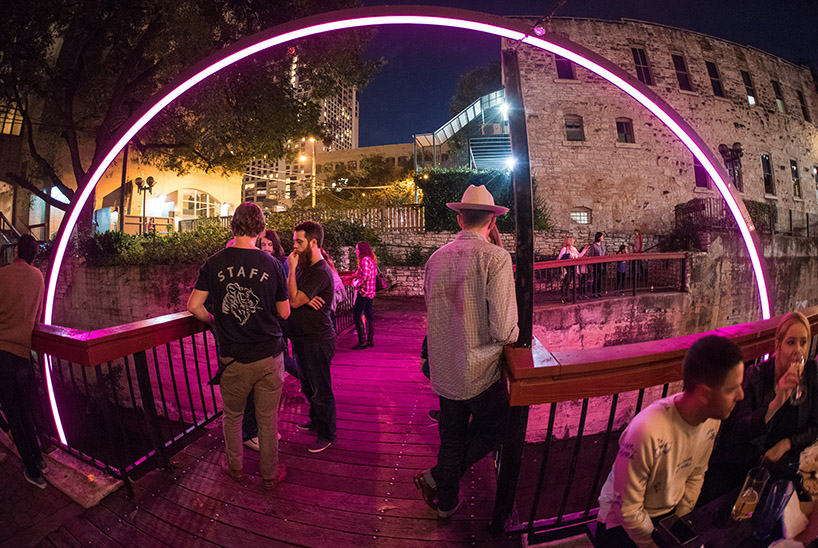 east side collective light up austin with a glowing LED arch