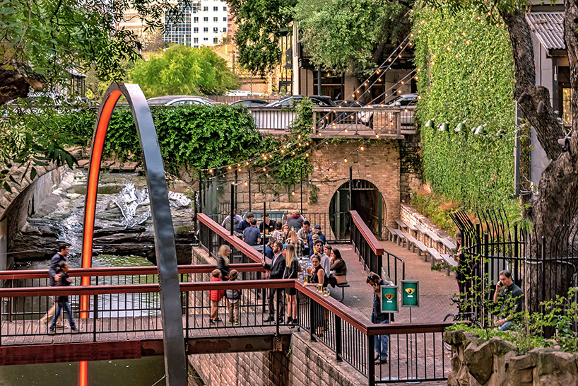 east side collective light up austin with a glowing LED arch