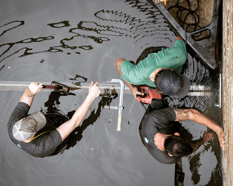 east side collective light up austin with a glowing LED arch