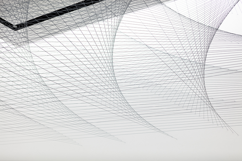 oniki layers 400 wires to create the CORD/CODE spatial installation in tokyo designboom