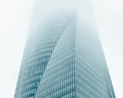 joel filipe photographs misty towers vanishing into the sky of madrid