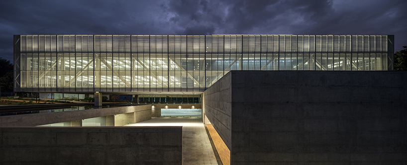 mira arquitetos houses CNM headquarters in a floating volume of glass + steel - 1