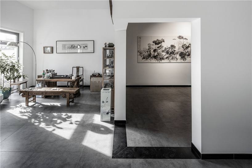 officeproject converts beijing factory building into artist's home and studio space