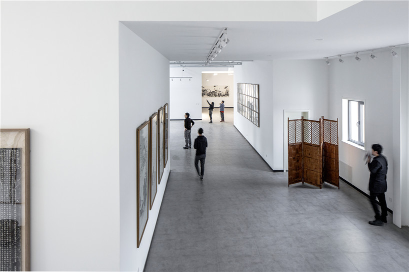 officeproject converts beijing factory building into artist's home and studio space