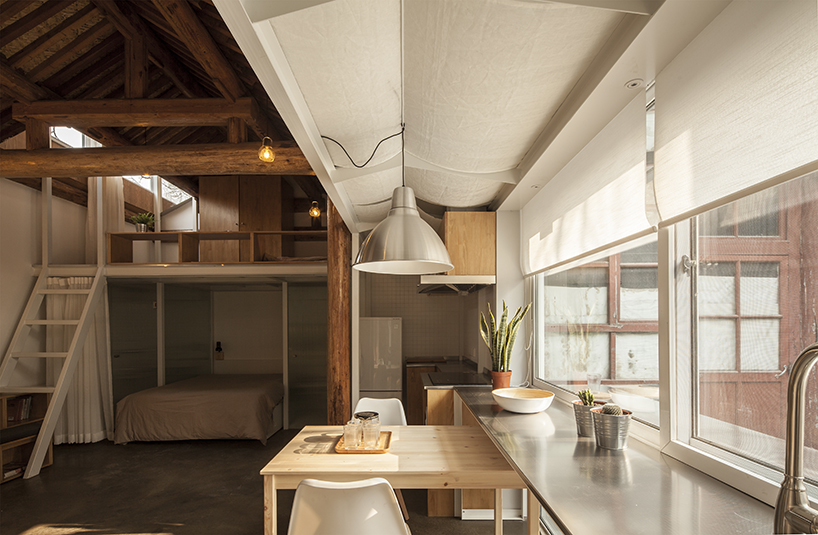 OEU-ChaO transforms beijing hutong into a cosy, cabin-like home - 1