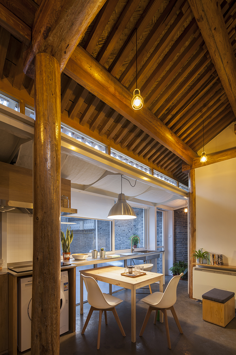 OEU-ChaO transforms beijing hutong into a cosy, cabin-like home