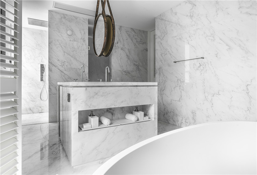 wei yi design creates a family home of monochrome + marble in nanjing, china