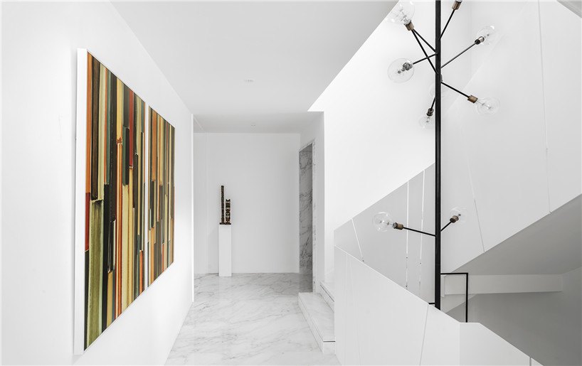 wei yi design creates a family home of monochrome + marble in nanjing, china - 1