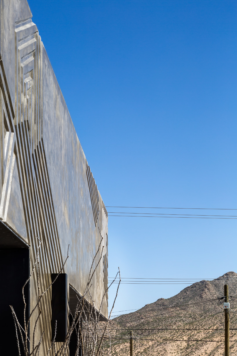 jorge urias studio's carved concrete structure portrays local dynamics in juarez, mexico