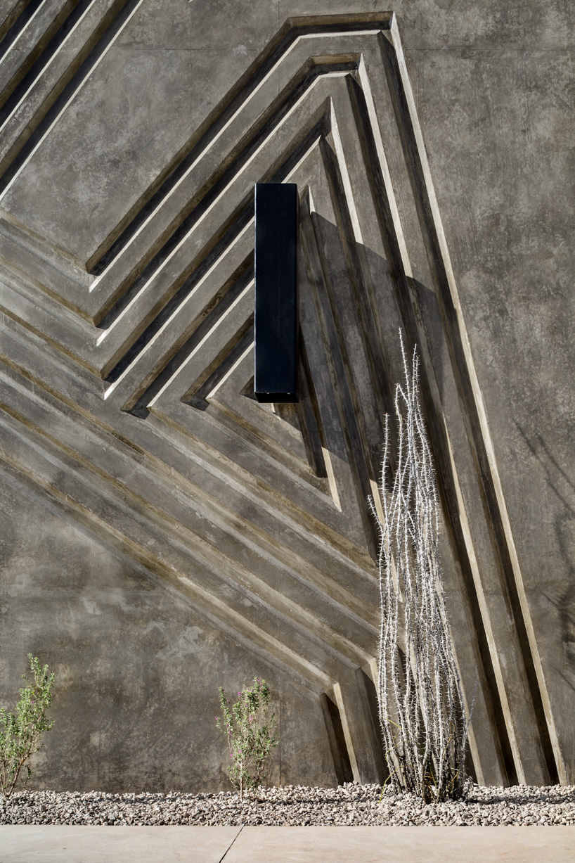 jorge urias studio's carved concrete structure portrays local dynamics in juarez, mexico