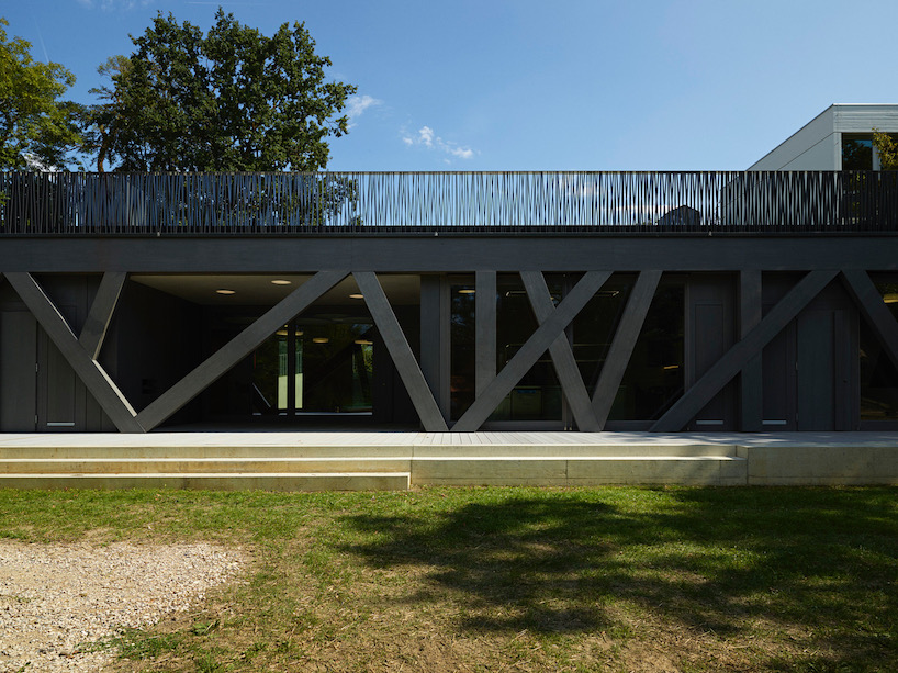 jardin robinson, a geometrical community center in geneva by SMA