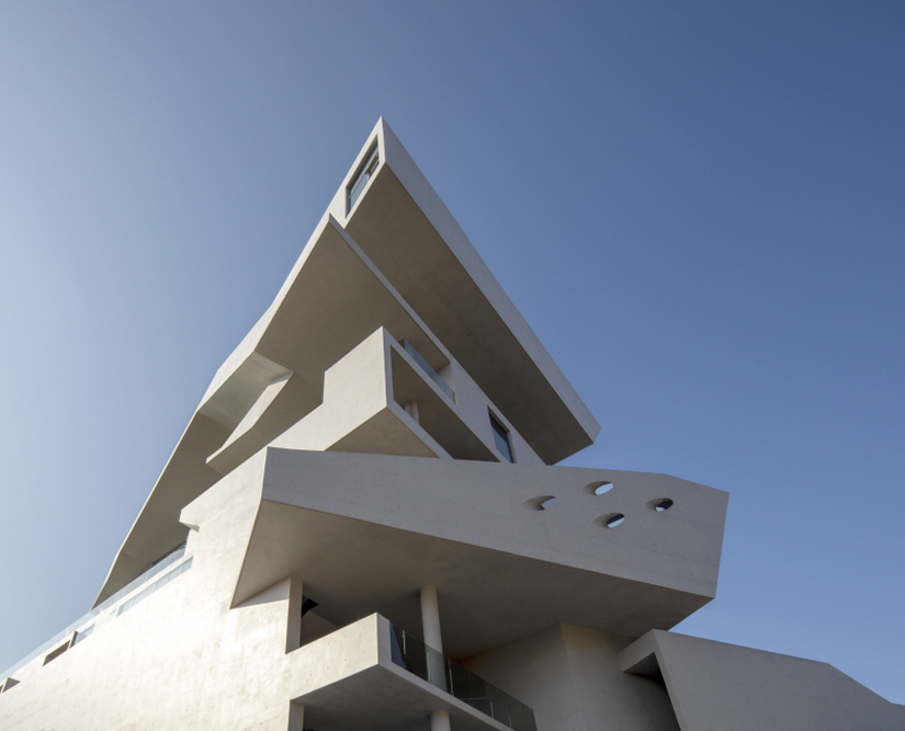 IDMM architects stacks angular concrete volumes to compose immersive hotel in korea
