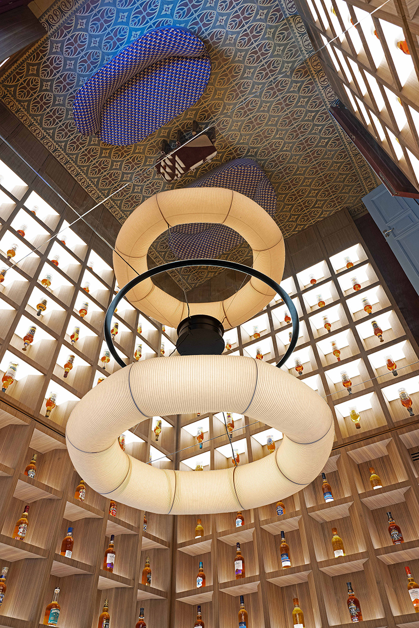 mirrored ceilings and textured glass shape club amis’ layered interiors in beirut - 7