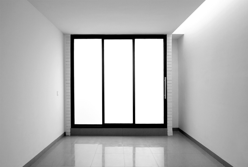 casas SP by S-AR + marisol gonzález is a monochromic complex of single-family houses