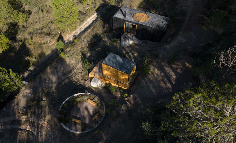 wooden shell wraps eco cabins by S-AR framing mexican valley views
