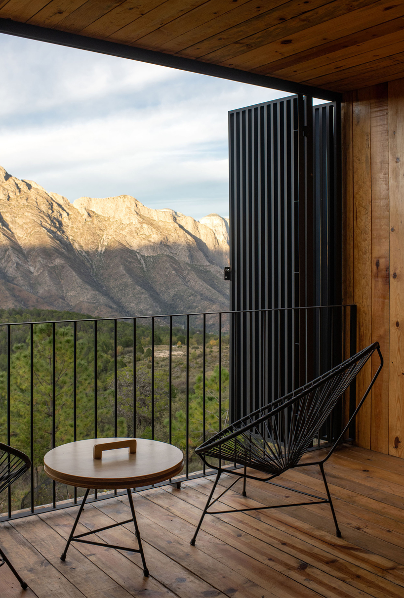 wooden shell wraps eco cabins by S-AR framing mexican valley views
