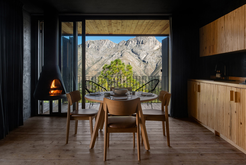 wooden shell wraps eco cabins by S-AR framing mexican valley views