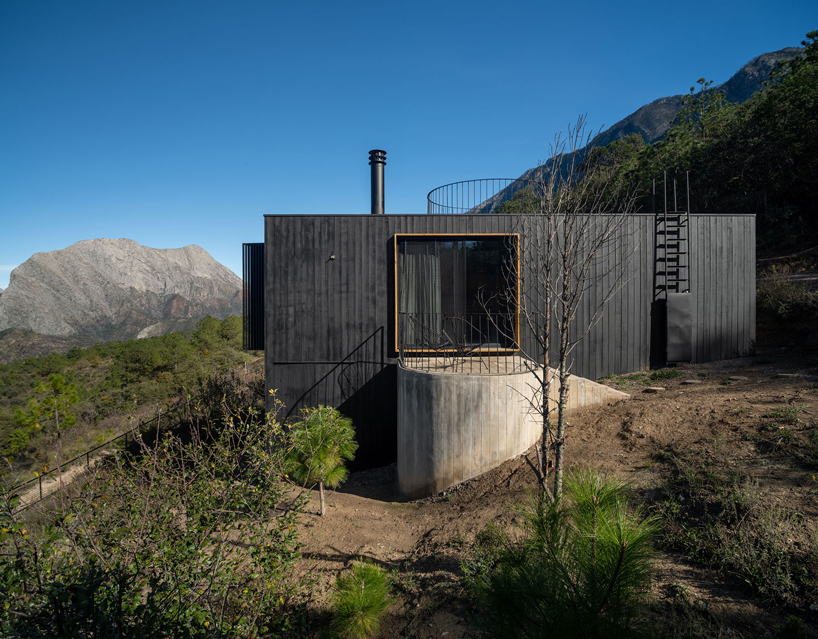 wooden shell wraps eco cabins by S-AR framing mexican valley views
