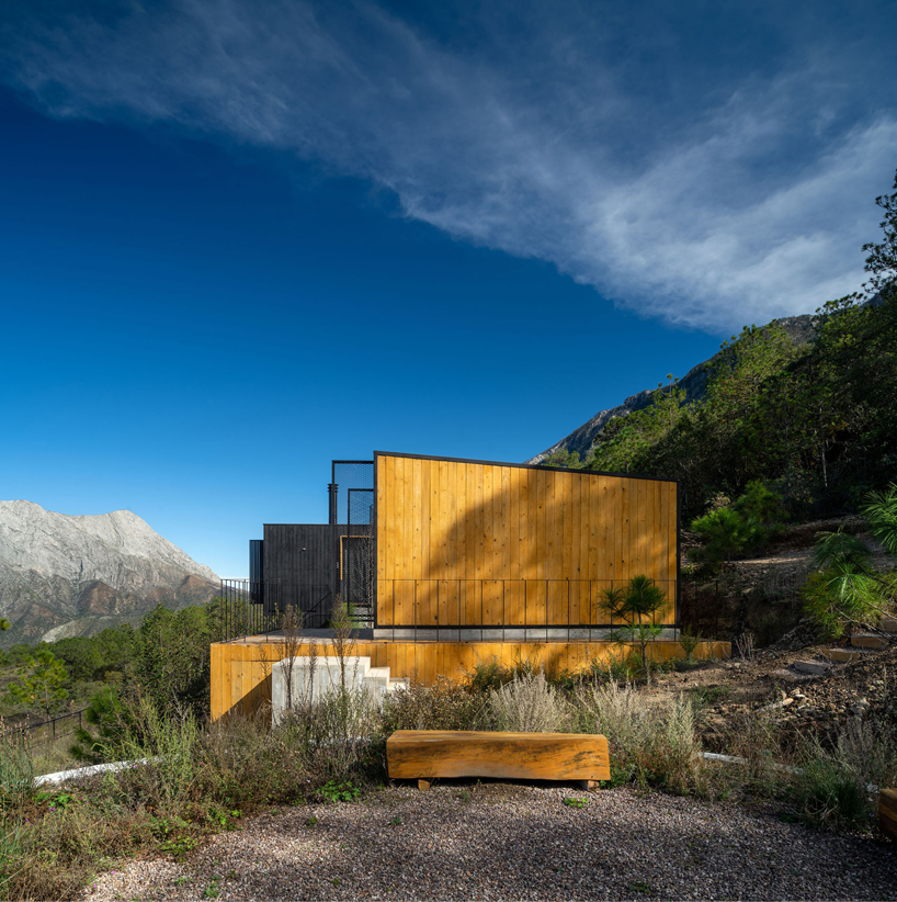 wooden shell wraps eco cabins by S-AR framing mexican valley views