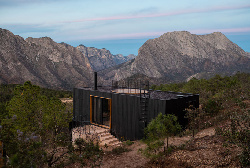 wooden shell wraps eco cabins by S-AR framing mexican valley views
