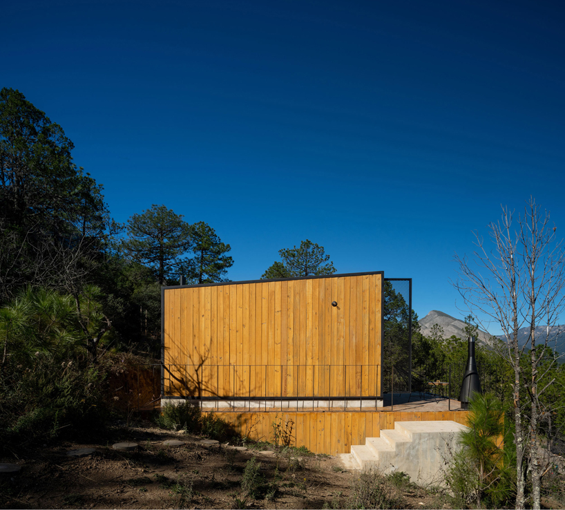wooden shell wraps eco cabins by S-AR framing mexican valley views