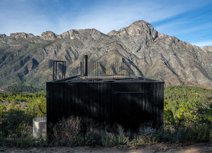 wooden shell wraps eco cabins by S-AR framing mexican valley views