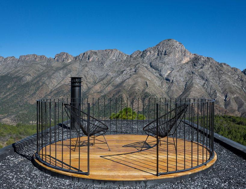 wooden shell wraps eco cabins by S-AR framing mexican valley views