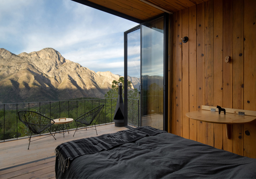 wooden shell wraps eco cabins by S-AR framing mexican valley views