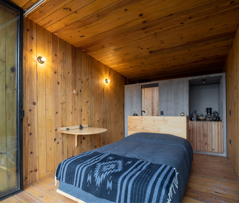 wooden shell wraps eco cabins by S-AR framing mexican valley views