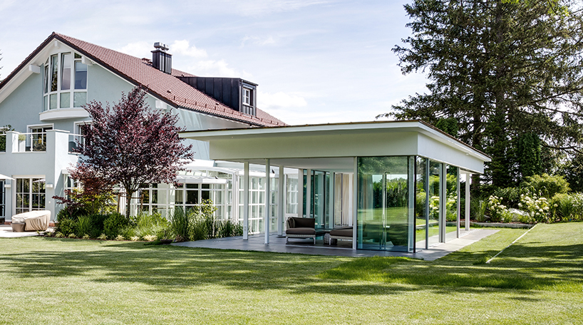 MEER architekten embeds private poolhouse as a glazed pavilion in ismaning, munich