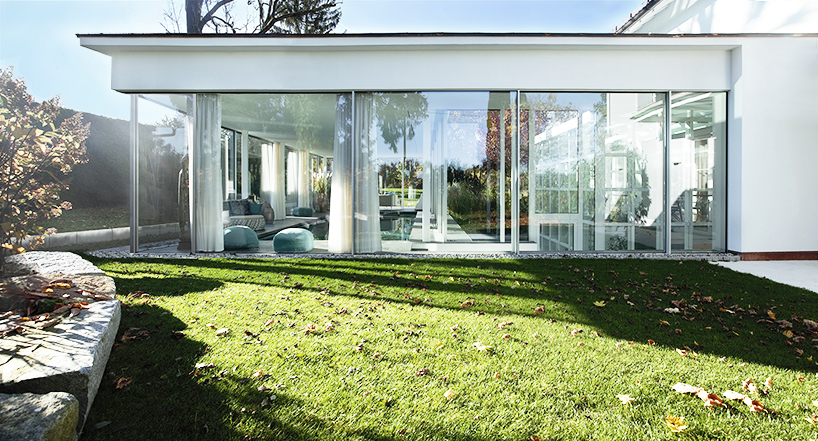 MEER architekten embeds private poolhouse as a glazed pavilion in ismaning, munich