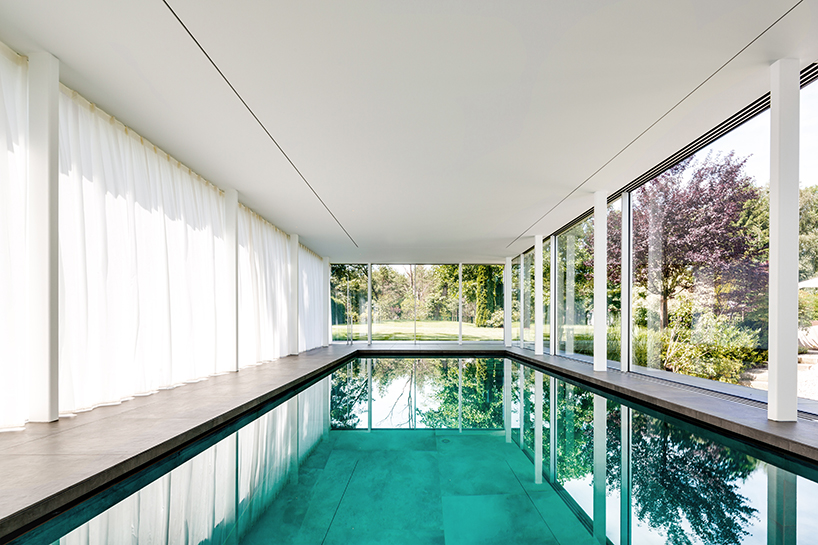 MEER architekten embeds private poolhouse as a glazed pavilion in ismaning, munich - 1