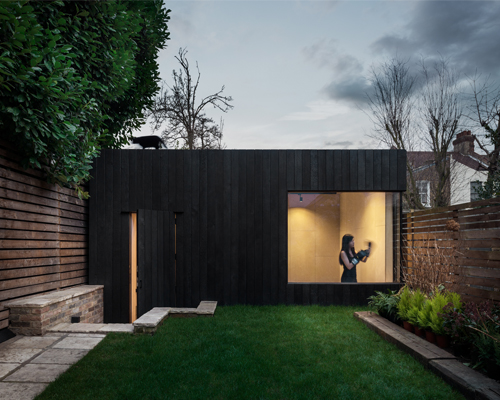 eastwest architecture completes garden house gym extension in london
