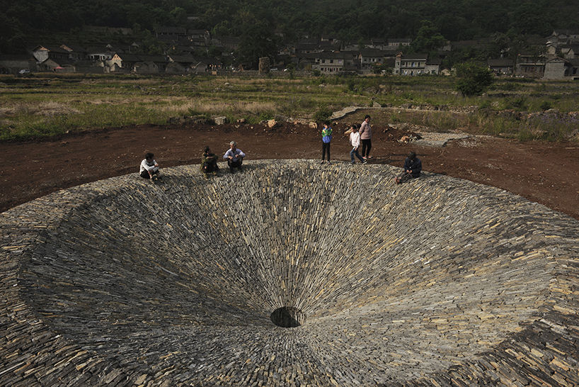V studio creates giant stone sinkhole to commemorate a village's disappearing rain cycle - 1