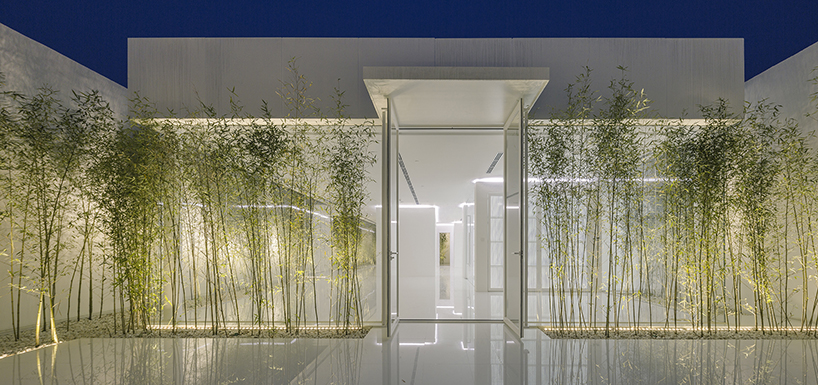 v studio's rooftop bamboo garden sits atop a busy chinese shopping mall