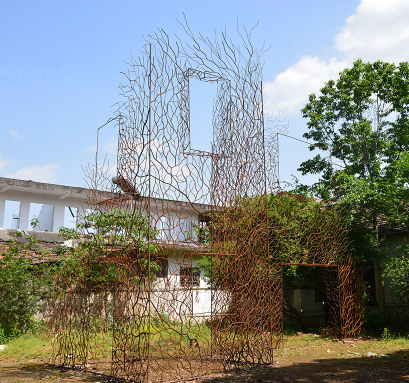 V studio's boston ivy-covered artwork preserves the memory of old shanty towns in china