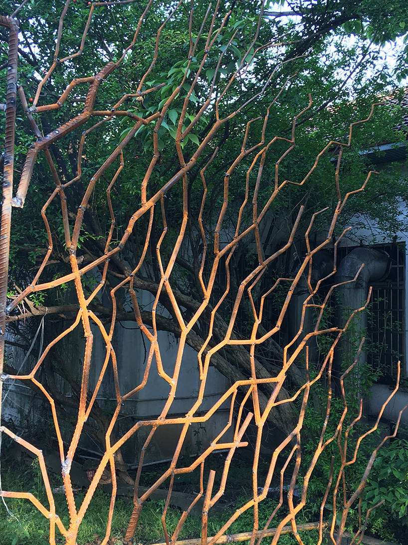 V studio's boston ivy-covered artwork preserves the memory of old shanty towns in china