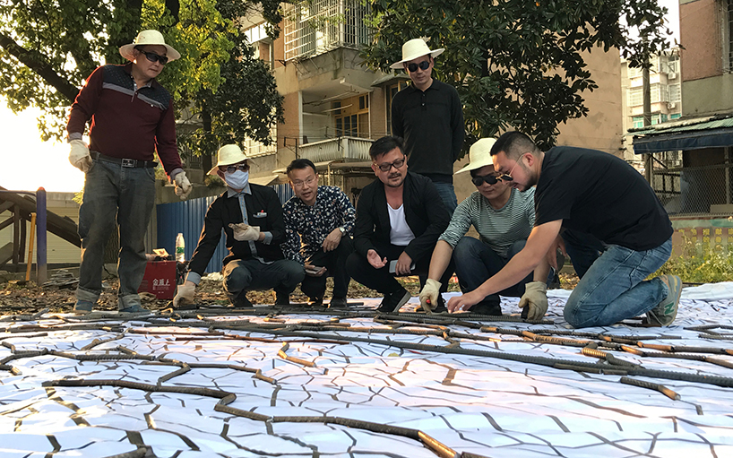 V studio's boston ivy-covered artwork preserves the memory of old shanty towns in china