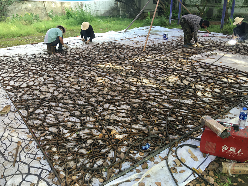 V studio's boston ivy-covered artwork preserves the memory of old shanty towns in china